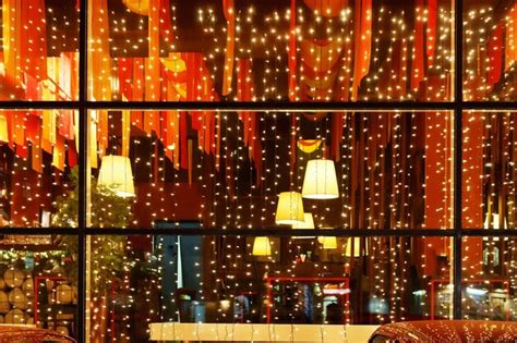 Premium Photo | Christmas decorative lights of restaurant window