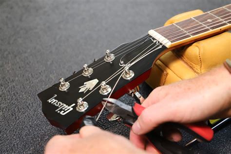 How To Restring A Bass Guitar Audiolover