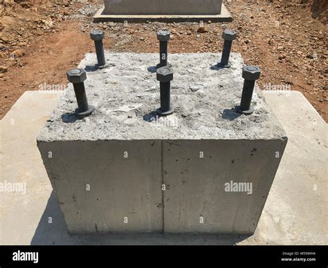 Reinforced Concrete Foundation With Metal Anchor Bolts Designed For The