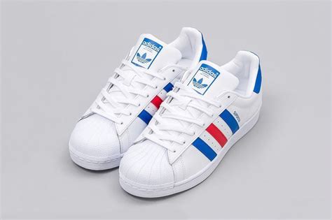 Venta Tenis Adidas Blancos Con Franjas Azules En Stock