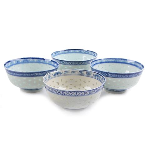 Four Chinese Blue and White Porcelain Rice Pattern Bowls | EBTH