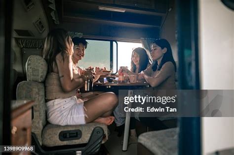 Asian Chinese Lesbian Couple And Friends Enjoying Breakfast In