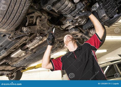 Handsome Mechanic Based On Car In Auto Repair Shop Stock Image Image