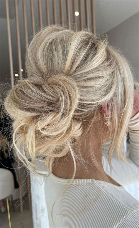 Chic Updos To Elevate Your Hair Game Timeless Messy Low Bun Wedding