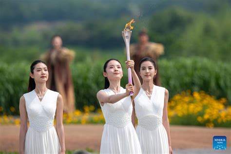 Flame For Hangzhou Asian Games Lit In Liangzhu Culture Site