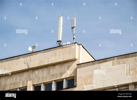 Gsm Cell Phone Antenna Tower On Rooftop Stock Photo Alamy