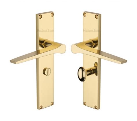 Heritage Brass Gio On Long Backplate Polished Brass Door Handles From Handles 4 Homes Ltd Uk