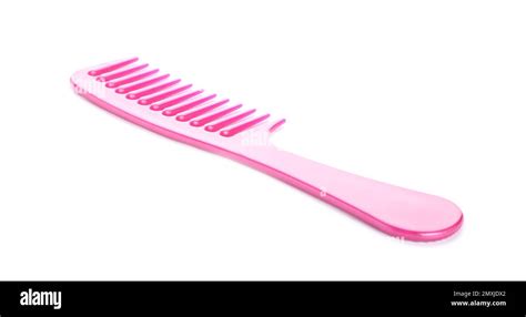 New pink hair comb isolated on white Stock Photo - Alamy