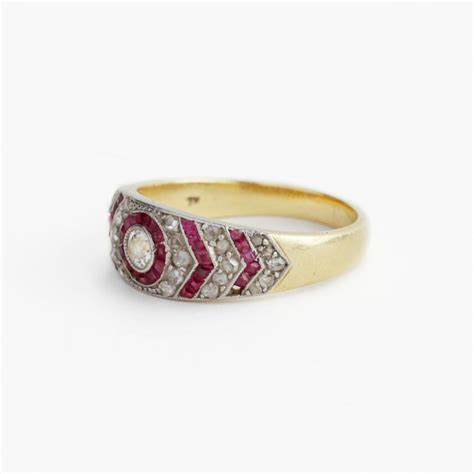 Anillo oro 18 K brillante rubíes y diamantes Zorrilla