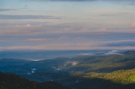 Premium Photo | Sunrise view and layers mountain with sea of mist at ...