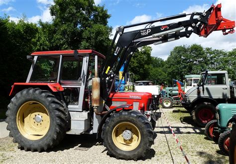 Schlüter Compact 950 V6 Allradschlepper mit angebautem Frontheber 6