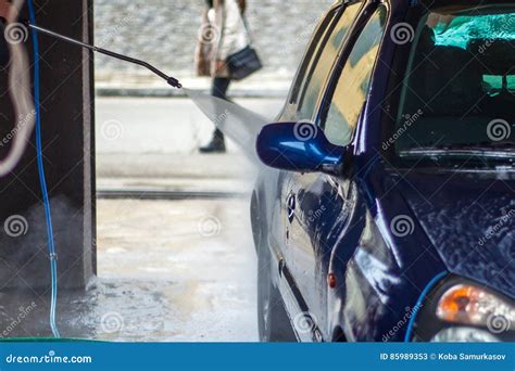 Car Wash Closeup Washing Car By High Pressure Water Stock Image