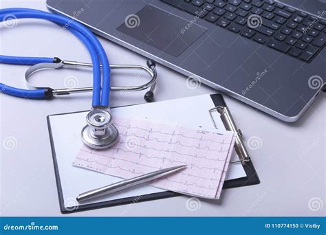 Workplace Of Doctor With Laptop Stethoscope RX Prescription And