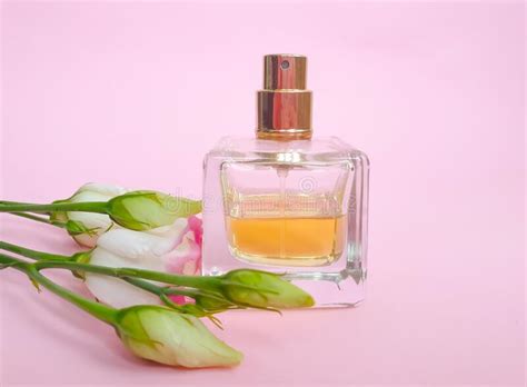 Bottle Perfume Flower Spray A Colored Background Elegant Stock Photo