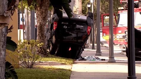 Vehicle Ends Upside Down After Rollover Crash In West Palm Beach