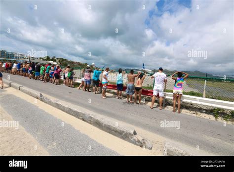 Jet Blast Challenge Spectators Waiting For An Aircraft To Take Off At