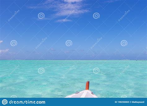 Beautiful Turquoise Water Under A Vibrant Blue Sky On A Tropical Island