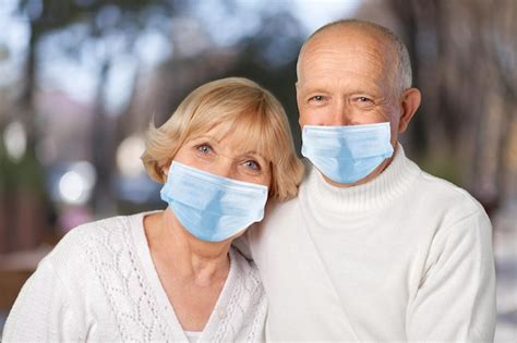 Premium Photo Cute Couple Of Two Seniors Wearing Medical Mask To