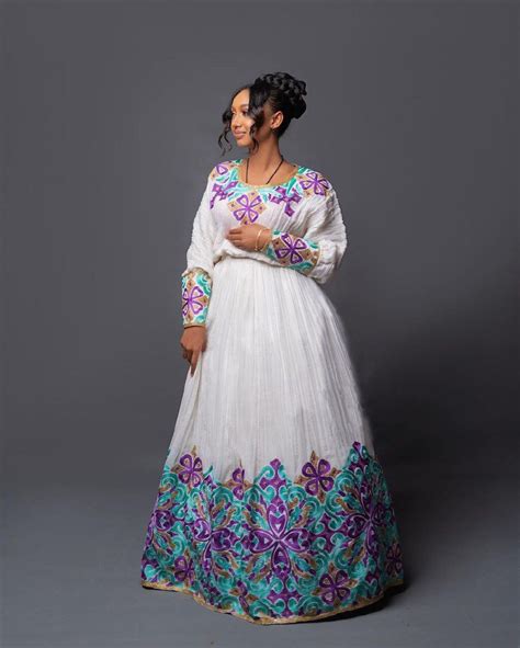 Regal Menen Habesha Kemis With A Stunning Purple And Blue Tilf Pattern