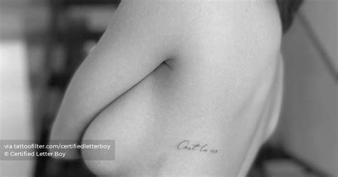 Cest L Vie Lettering Tattoo Located On The Rib