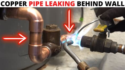 Plumbing Emergency Service Call Copper Pipe Leaking Water Behind The