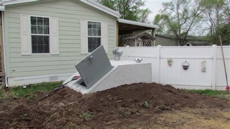 Below Ground Tornado Shelters - Garage Underground Storm Shelters