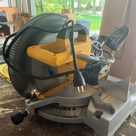 Lot 469 DeWalt Compound Miter Saw EstateSales Org