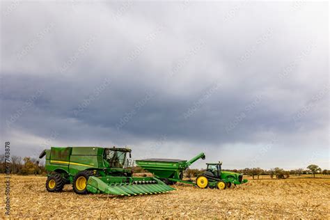 John Deere S780 Combine With A 612 C Corn Head And A John Deere 8295 RT