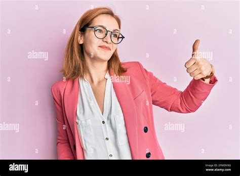 Young Caucasian Woman Wearing Business Style And Glasses Looking Proud