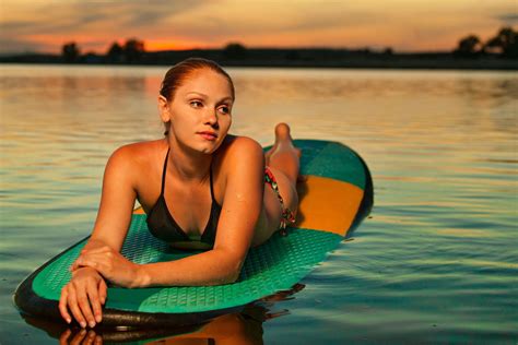 Woman Resting On A Paddle Board On A Lake By Ben North On Pxwoman