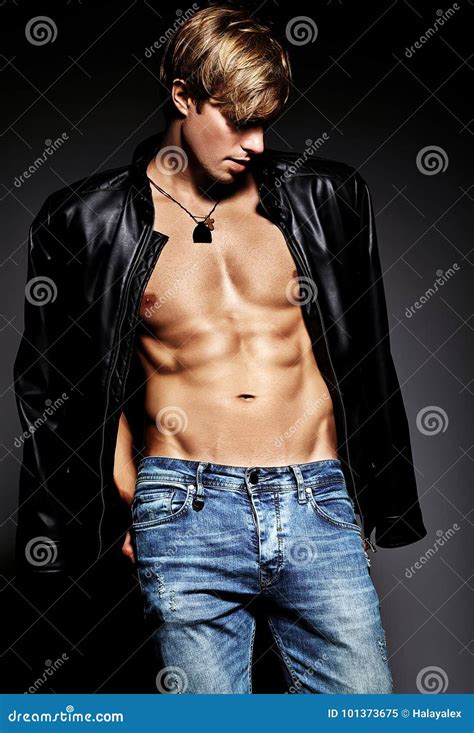 Handsome Muscled Fit Male Model Man Posing In Studio Stock Image