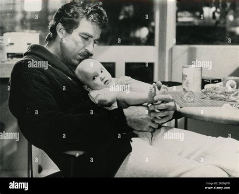 American actor Tom Selleck in the movie Three Men and a Baby, USA 1988 ...