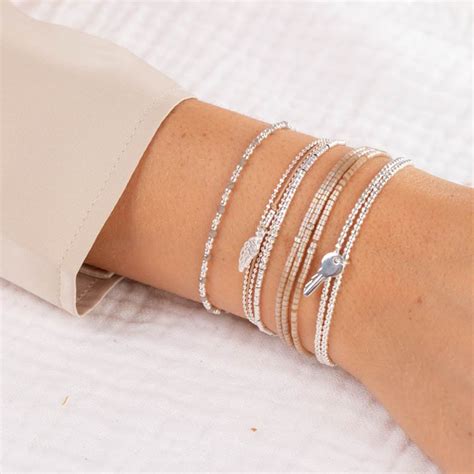 Bracelet fin élastiqué MAYOTTE argent Perles marron beige irisé TAILLE M