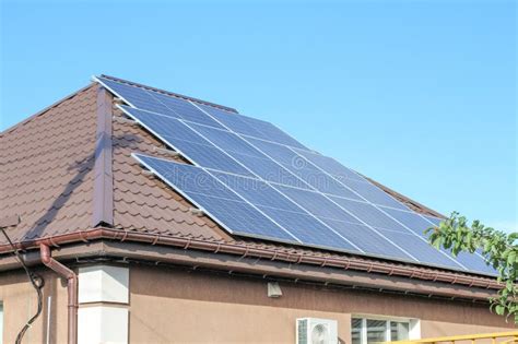 Solar Panels On Roof Of House Photovoltaic Panels Solar Stock Photo