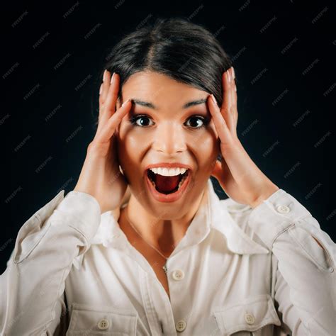 Premium Photo | Beautiful young woman feeling surprised or expressing ...