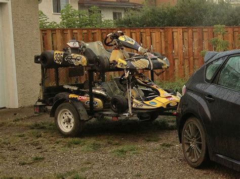 Two Karts On A Trailer Attached To A Wrx Closeup Crop Go Kart