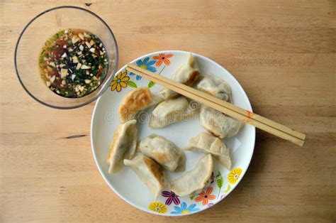 Fried Chinese Dumplings on Plate Stock Image - Image of lifestyle, asian: 138967633