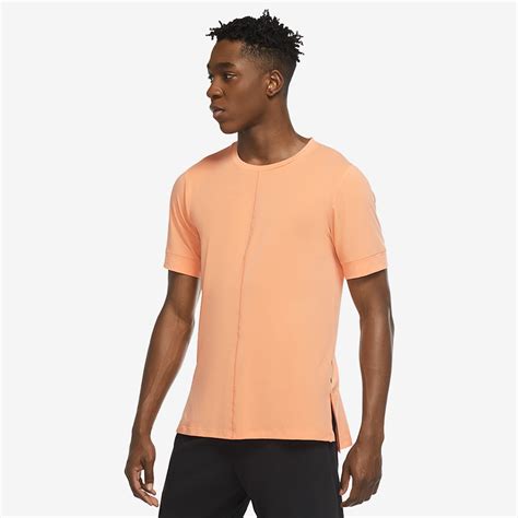 Nike Yoga Dri Fit T Shirt Orange Frost Black Mens Clothing