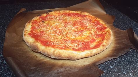 How To Cook Pizza On Parchment Paper And Foil Crust Kingdom