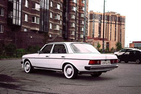 Green Mercedes Benz W123 Parked Near Tree · Free Stock Photo