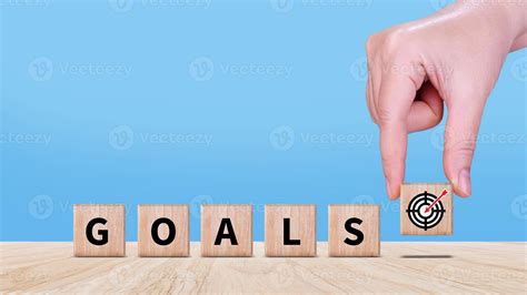 Hands Place Virtual Target Board And Arrows On Wooden Block Business Success Goals And