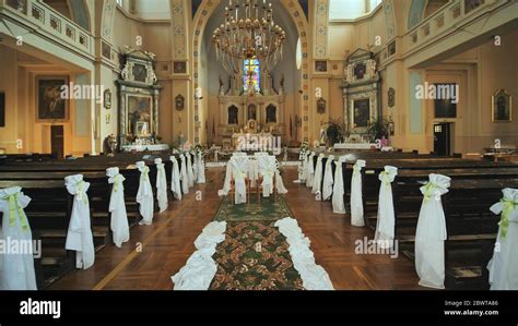 Interior of a catholic church before the wedding Stock Photo - Alamy