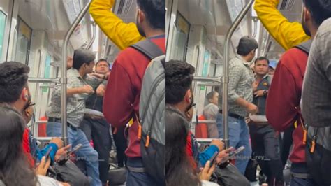 Two Men Fight Over Seat Issue In Delhi Metro Watch Viral Video। Video