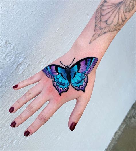 Butterfly Hand Tattoo