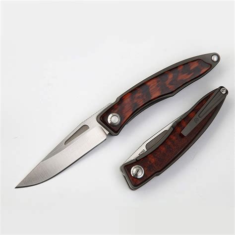 Mahogany Fold Blade Silver Invictus Edge Touch Of Modern