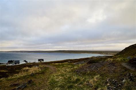 Varde, Norway - June 23, 2019: Calm Landscape with Water and Fishing Village on the Bank of a ...