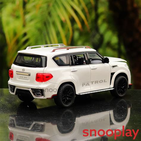 Buy Nissan Patrol Diecast Car With Openable Parts Lights And Sounds