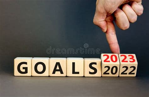 Planning 2023 Growth New Year Symbol Businessman Turns A Wooden Cube