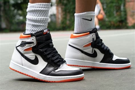 Heres How People Are Styling The Air Jordan 1 Electro Orange Industry News