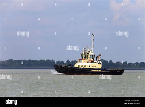 Tug Boat Svitzer Shotley At Work In The Port Of Felixstowe Stock Photo